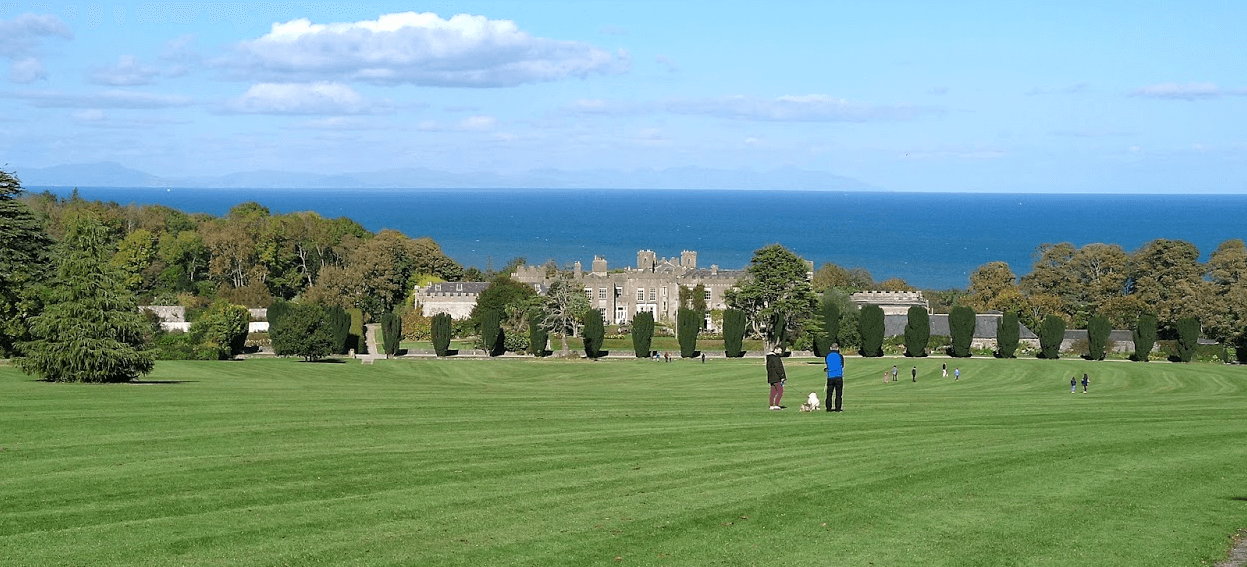 The stunning landscape of Ardgillian Castle with the sea in the background