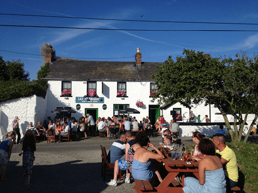 A busy beer garden in the picturesque coastal village of Carlingford